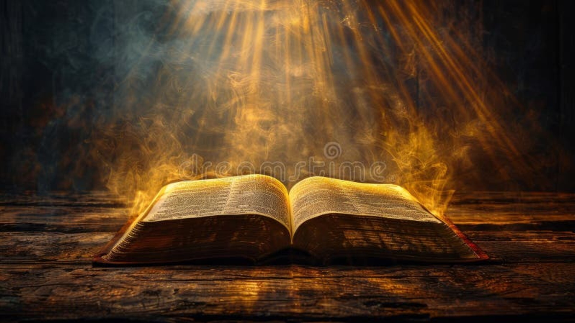 Open Bible illuminated by warm golden light
